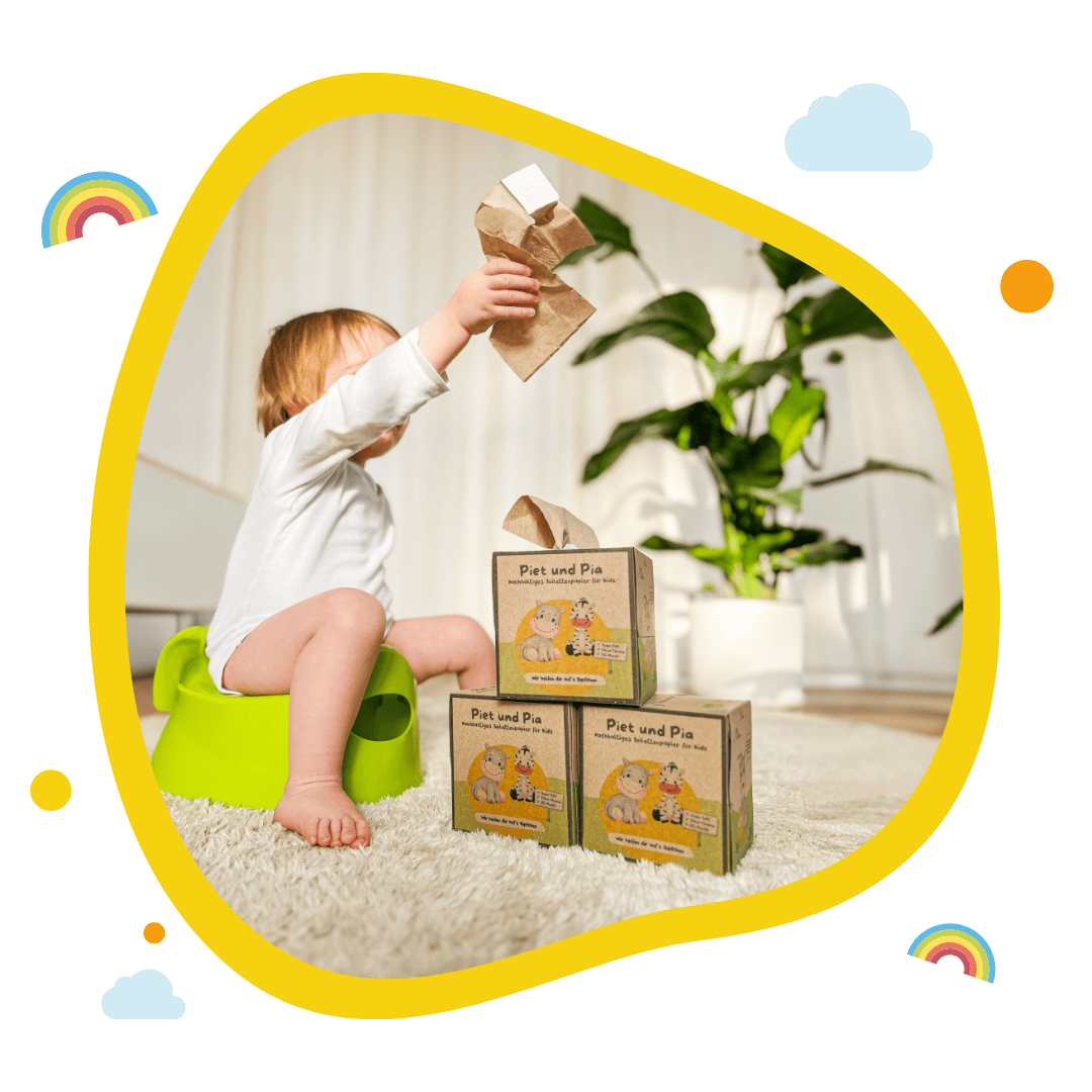 Kind auf Töpfchen mit Toilettenpapier